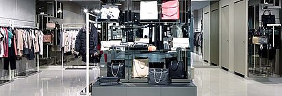 Fashion store with rented sales space for a shop-in-shop shelf of a brand bag manufacturer